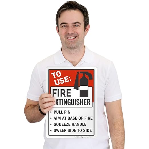SmartSign 7"x5" "To Use Fire Extinguisher - Pull Pin, Aim at Fire, Squeeze Handle, Sweep' Sticker Label with Symbol, 3 mil Laminated Adhesive Polyester, Red/Black/White, USA-Made