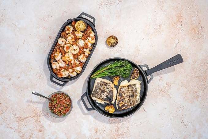 ooni Cast Iron Sizzler Pan - Griddle Frying Pan, 12" x 6" Sizzler Plate with Removable Handle and Stainless Steel Trivet, Pre-Seasoned Non-Stick Oven Safe Cookware, Pizza Oven and BBQ Accessories