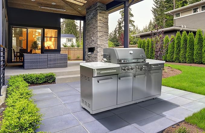 Mont Alpi Premium 70"W x 24"D Stainless Steel Compact Outdoor Kitchen Island with Access Doors + 32"W 4-Burner BBQ Gas Grill with Infrared Rear Burner + Storage Cabinets + White Granite Countertops